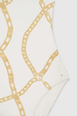 Anine Bing | Jace One Piece - Cream -Clothing Shop AB JACE ONE PIECE CREAM AND TAN LINK PRINTA 11 0107 122 2 1700x 9f2eed51 49f8 41ba 83a3 ba7e74f26f77