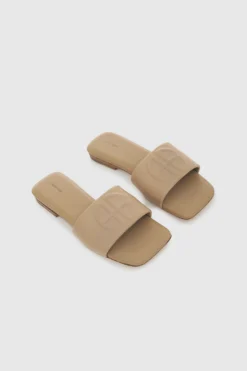 Anine Bing | Ria Slides - Butterscotch Monogram -Clothing Shop AB RIA SLIDES BUTTERSCOTCH MONOGRAMA 14 9100 270 2 1700x 97478bd5 3df9 4b20 b626 cf1e65984be5